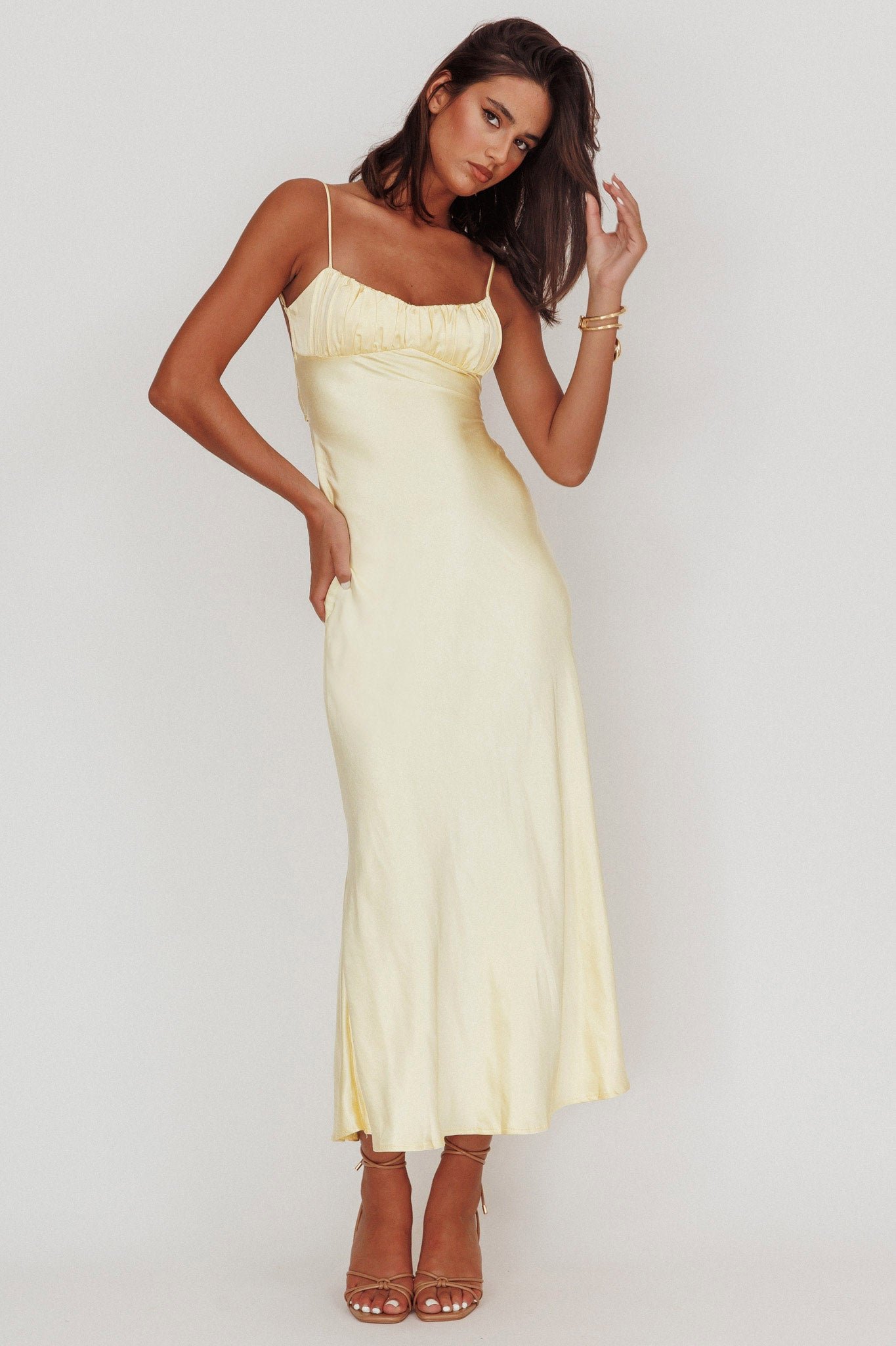 64147B03_20LEMON-1 Nerida Twist Back Satin Maxi Dress Lemon - Image 1