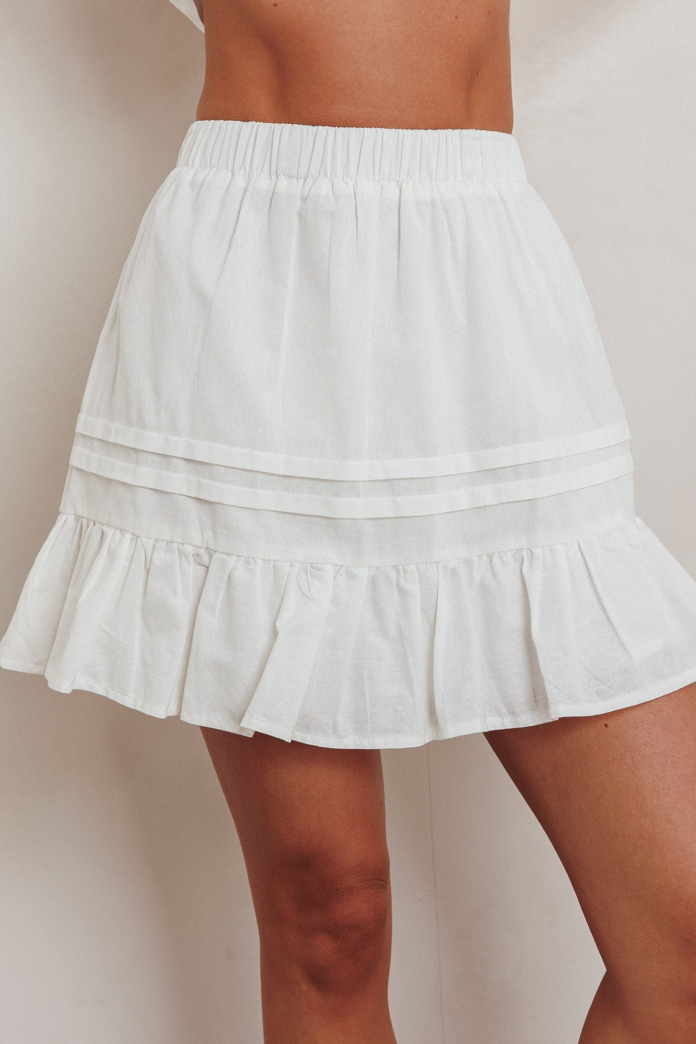SR1401J-S_20WHITE-4 Danessa Frill Hem Pintuck Skirt White - Image 1