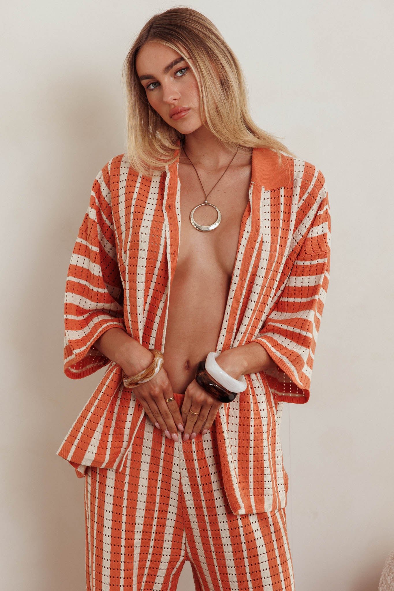 ST5109H-T_20ORANGE-1 Influence Knit Relaxed Shirt Orange - Image 1